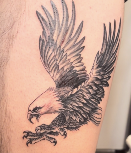 Grayscale realism eagle tattoo